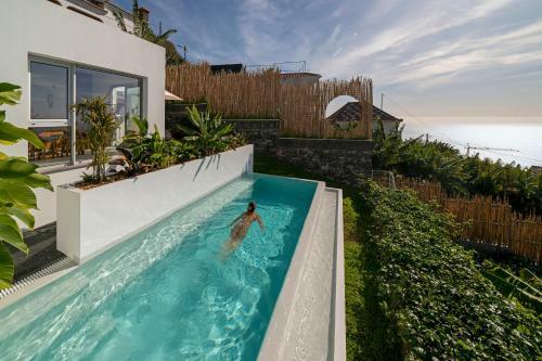 Casas Da Vargem Shared Swimming Pool By An Island Apart
