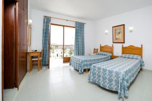 Aparthotel Hostal La Perla