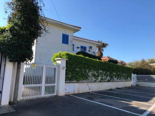 Mondello Beach The House With Green Lawns