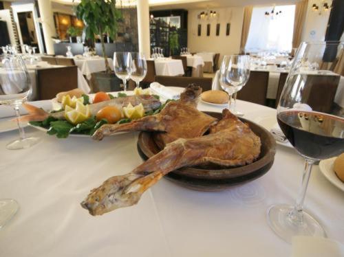 Hotel Asador H.m. Versus