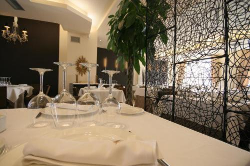 Hotel Asador H.m. Versus
