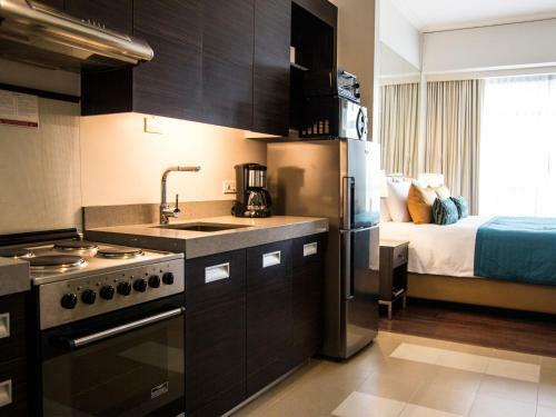 Aparthotel Aruga By Rockwell Hotel