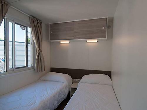 Appealing Mobile Home In Sorso With Shared Pool