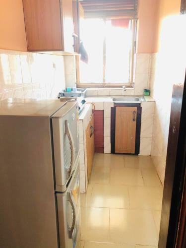 Apartamento Uzuri Homes
