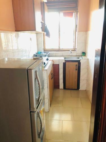 Apartamento Uzuri Homes