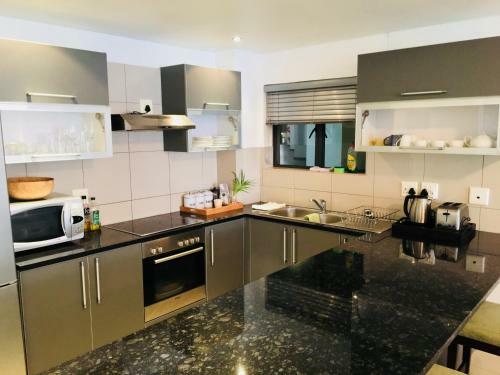 Apartamento Flatrock Suites