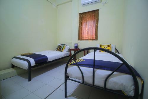 Hotel Spot On 2305 Andys Nur Penginapan