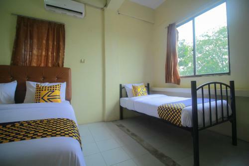 Hotel Spot On 2305 Andys Nur Penginapan