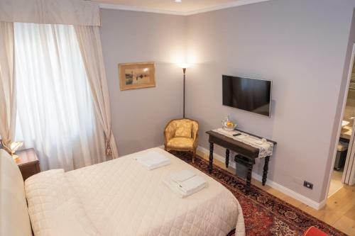 Hostal La Nuova Corte Rooms