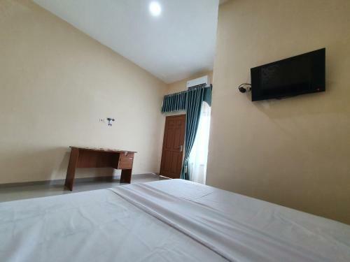 Hotel Oyo 90945 Arizon Kost