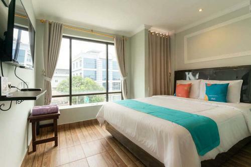 Sans Hotel Ta Ke Talang Banjar Jambi