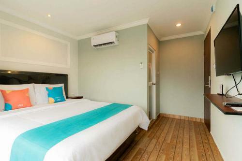 Sans Hotel Ta Ke Talang Banjar Jambi