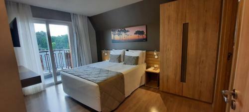 Apartamento Golden Gramado Resort - Laghetto - 02 Quartos