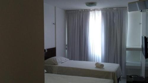 Apartamento Confort�vel Apt 218