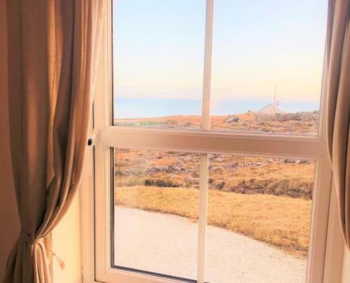 Apartamento Doughbeg Beach Cottage