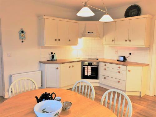 Apartamento Doughbeg Beach Cottage