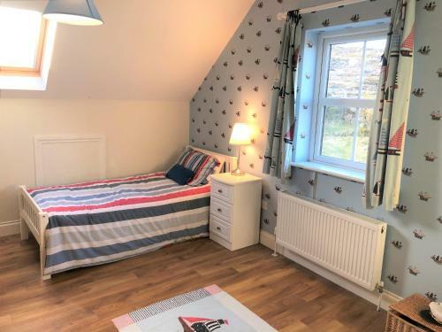 Apartamento Doughbeg Beach Cottage