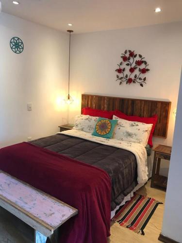 Hostal Aconchego Su�tes