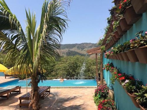 Hostal Aconchego Su�tes