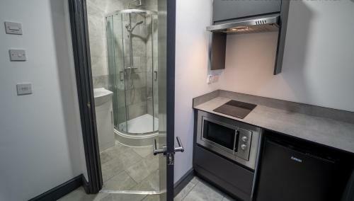 Apartamento Spacious Serviced Studio With Large Kitchenette