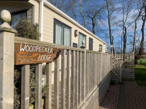 Woodpecker Lodge, Camelot Holiday Park, Ca6 5sz