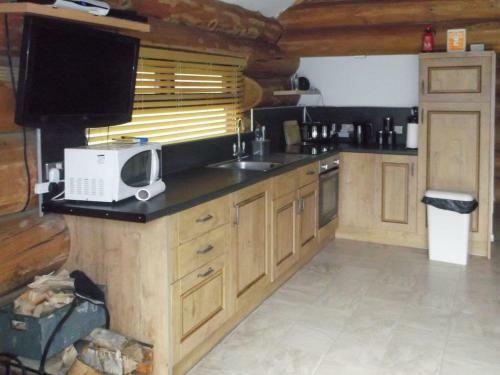Lyne View, Log Cabin