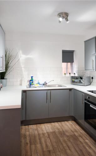 Apartamento The Kop End Serviced Accommodation - 4 Bedrooms, 2 Bathrooms