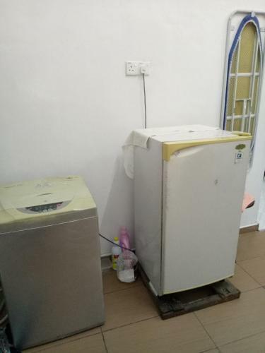 Apartamento Aiman Homestay