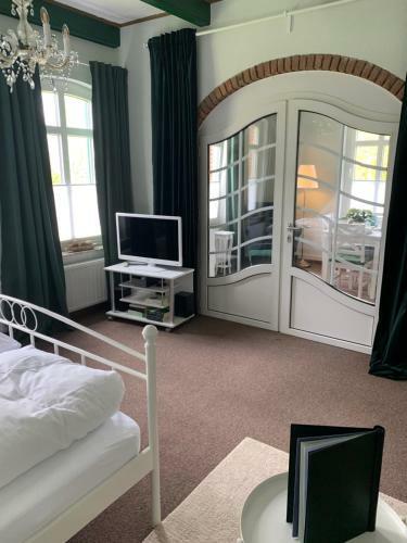 Apartamento Huus Achterdiek Ferienwohnungen