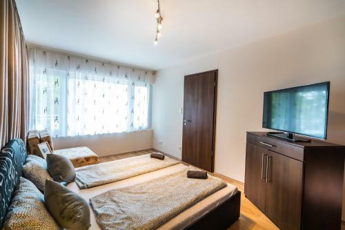 Siesta Sziget - Panor�m�s Balatonparti Apartmanok