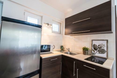 Siesta Sziget - Panor�m�s Balatonparti Apartmanok