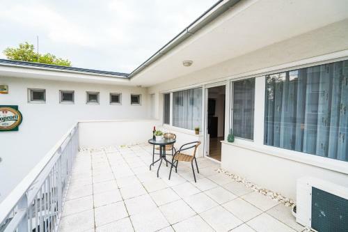 Siesta Sziget - Panor�m�s Balatonparti Apartmanok