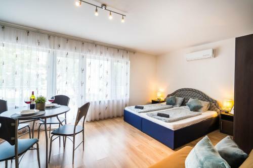 Siesta Sziget - Panor�m�s Balatonparti Apartmanok