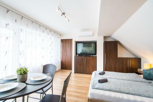 Siesta Sziget - Panor�m�s Balatonparti Apartmanok