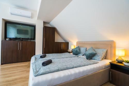 Siesta Sziget - Panor�m�s Balatonparti Apartmanok