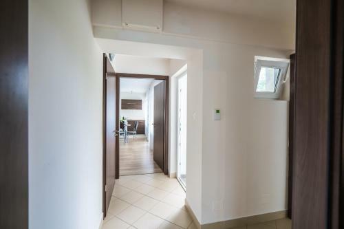 Siesta Sziget - Panor�m�s Balatonparti Apartmanok
