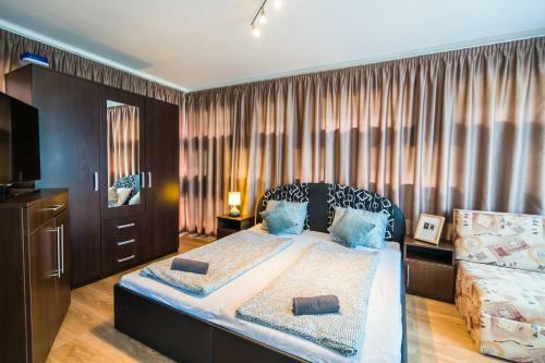 Siesta Sziget - Panor�m�s Balatonparti Apartmanok