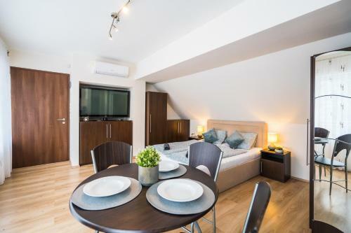 Siesta Sziget - Panor�m�s Balatonparti Apartmanok