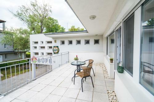 Siesta Sziget - Panor�m�s Balatonparti Apartmanok