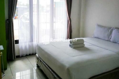 Hotel Sky Flores Bunglaow Syariah Redpartner
