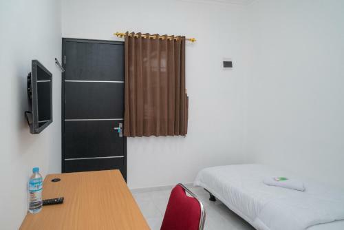 Hotel Mahagoni House Bogor Syariah Redpartner