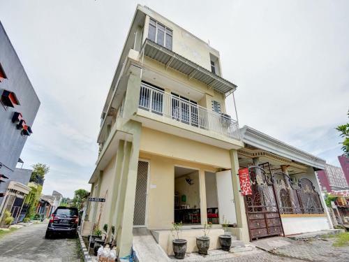 Hotel Oyo 90794 Kostel Bunda Waru Syariah