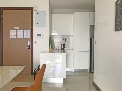 Apartamento Paragon Residences Straits View Homestay