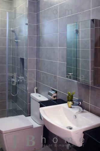 Apartamento Paragon Residences Straits View Homestay
