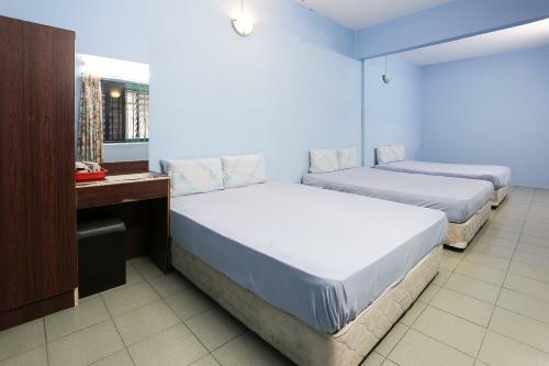 Spot On 89989 Wispering Hotel