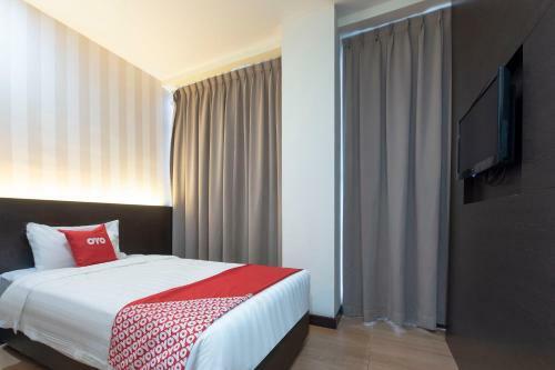 Capital O 90447 Hotel Ezzyhome Kebun Teh