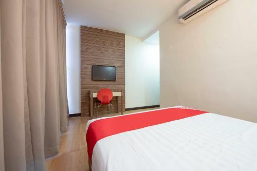 Capital O 90447 Hotel Ezzyhome Kebun Teh