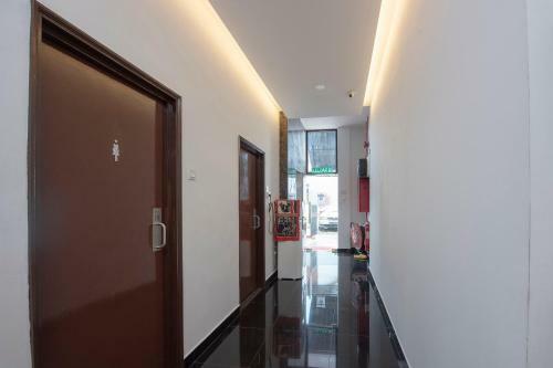 Capital O 90447 Hotel Ezzyhome Kebun Teh