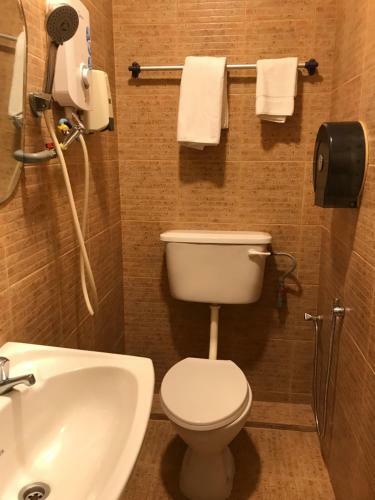 Oyo 90487 K Threegod Hotel