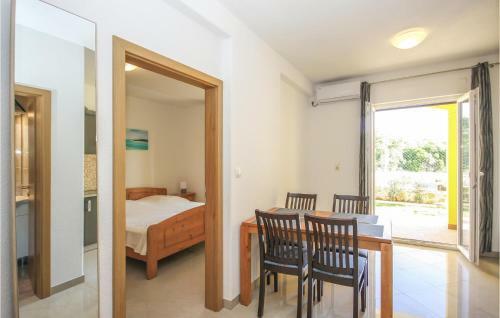 Amazing Apartment In Pomer With 1 Bedrooms